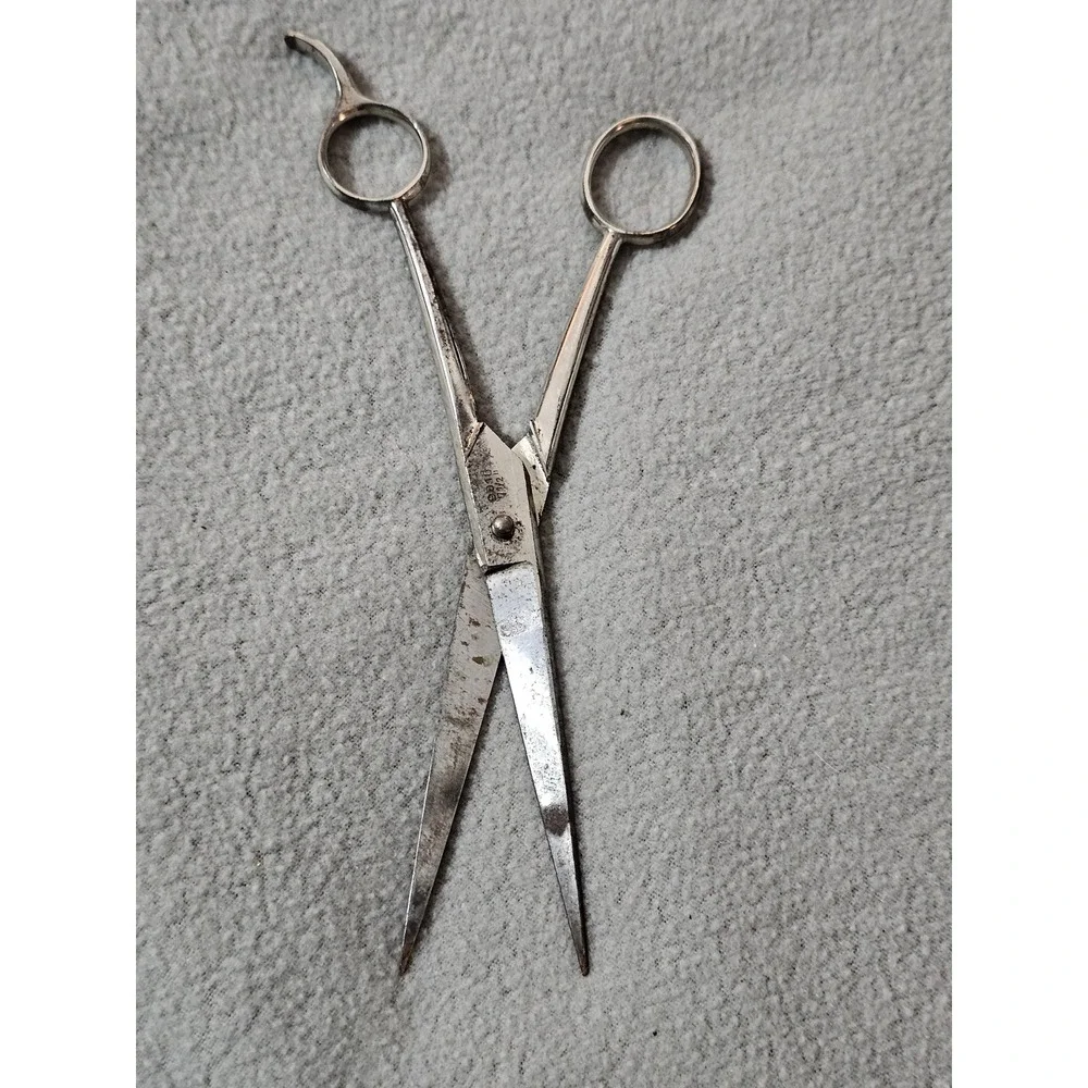 vintage silver metal hair scissors manufactured by Griffon in Germany collect